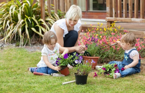 Lawn mowing in a compact urban garden