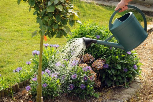 Gardener preparing tools at start of job